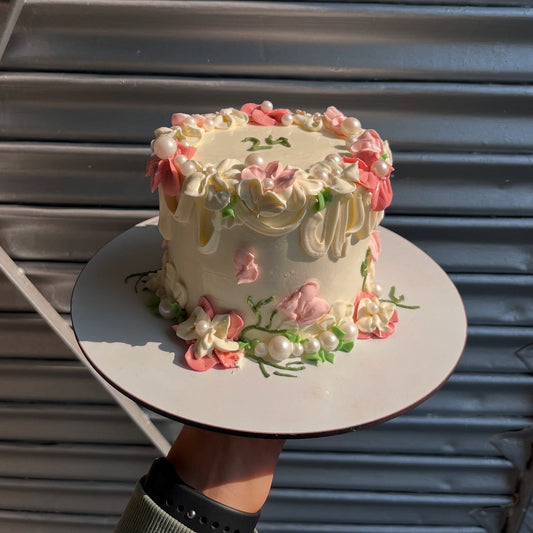 Floral buttercream garden with pearls