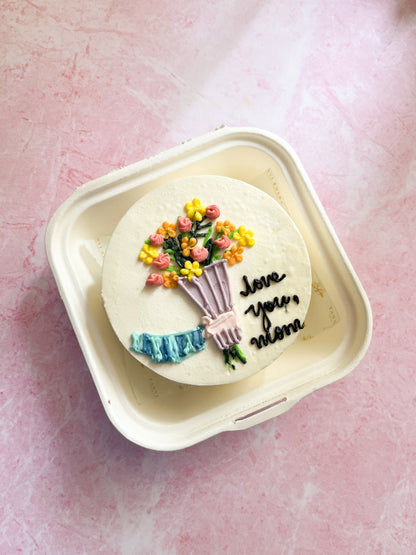 Hand holding Flower Bouquet Bento Cake