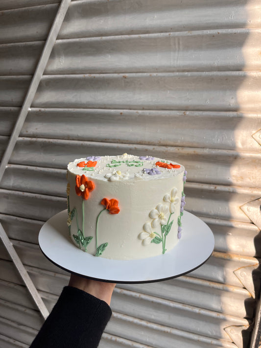 Floral Orange and White Cake