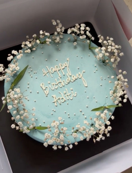 Baby breath Adorned Pastel Blue Cake